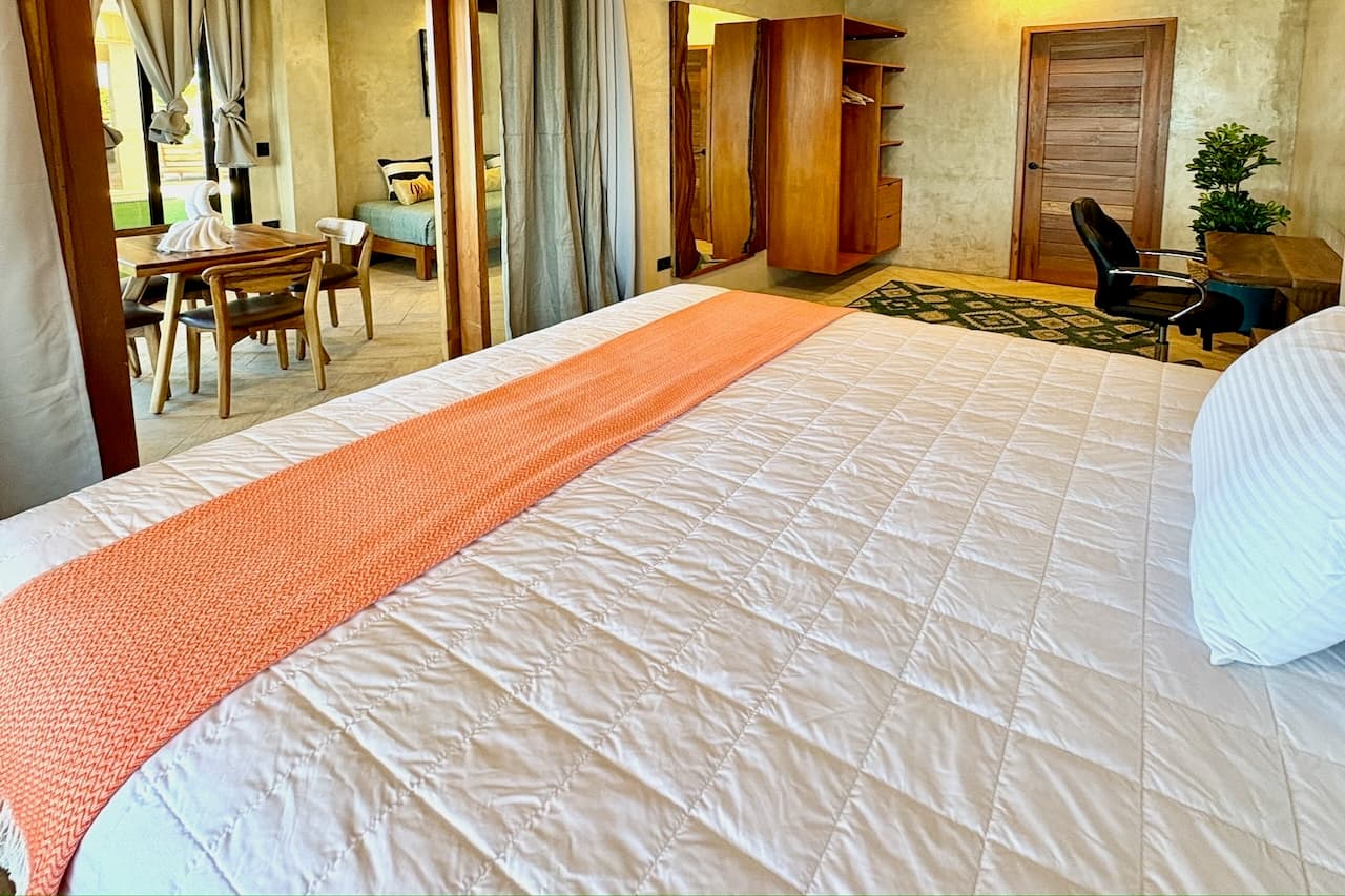 Bedroom with ocean view in the Ocean Master Room at Miramar SurfCamp