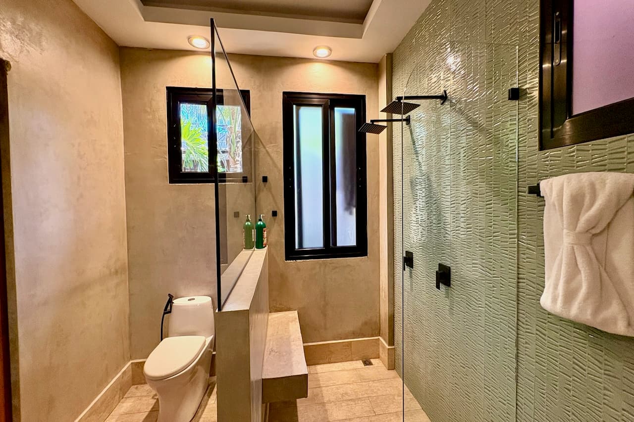 Modern private bathroom in the Ocean Master Room at Miramar SurfCamp