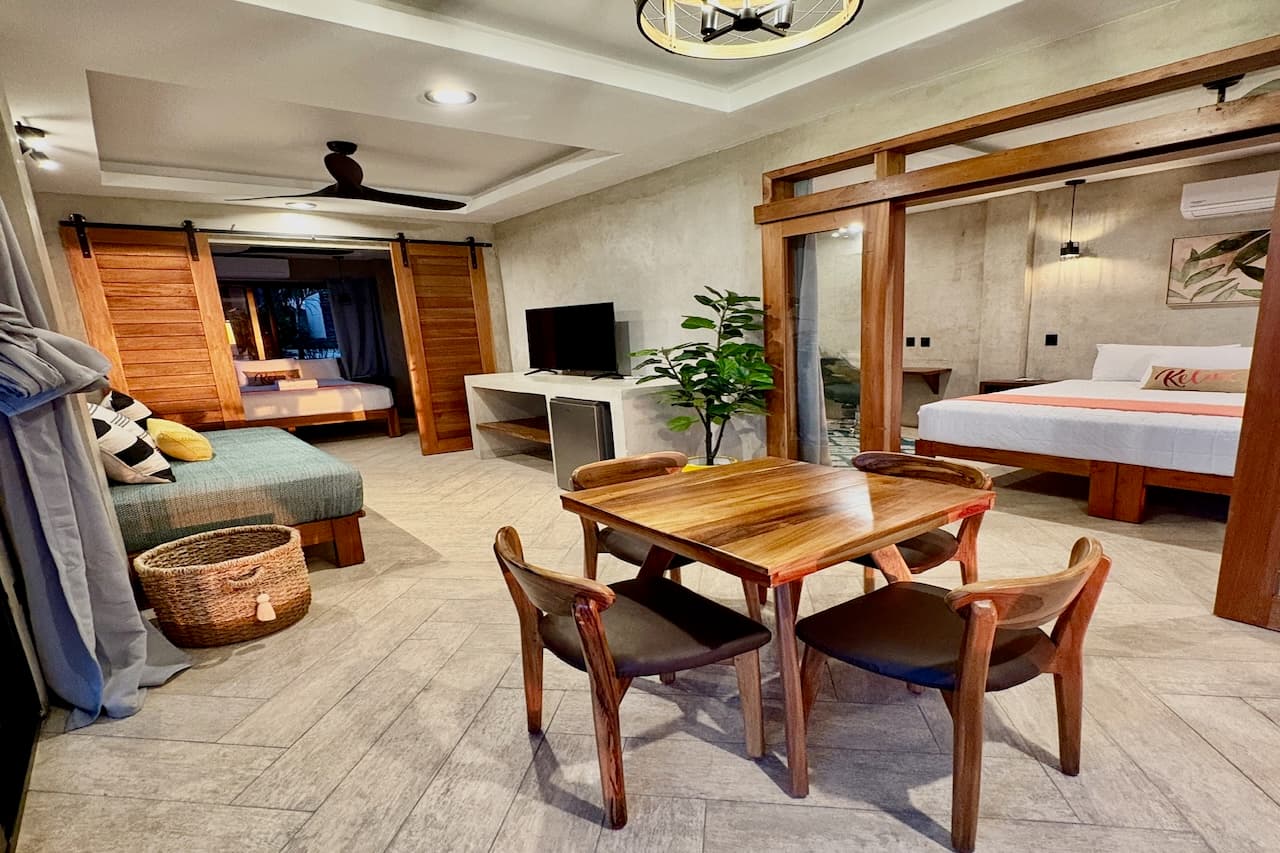 Comfortable and airy interior space in the Ocean Master Room at Miramar SurfCamp
